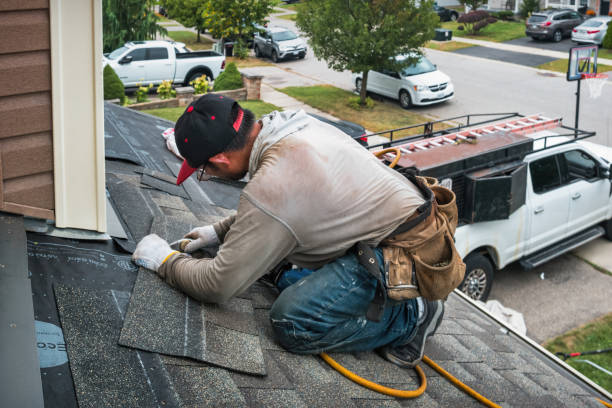 Professional Roofing technician working in Mansfield Depot, CT